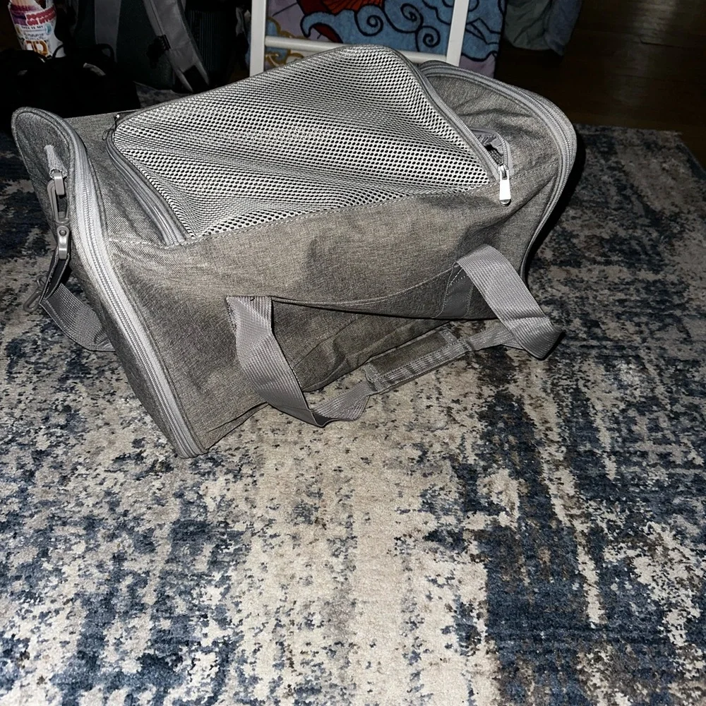 Airport approved pet carrier. Carries up to 50lbs.